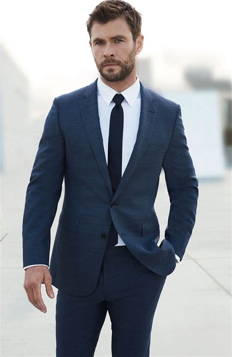 navy blue suit black tie.